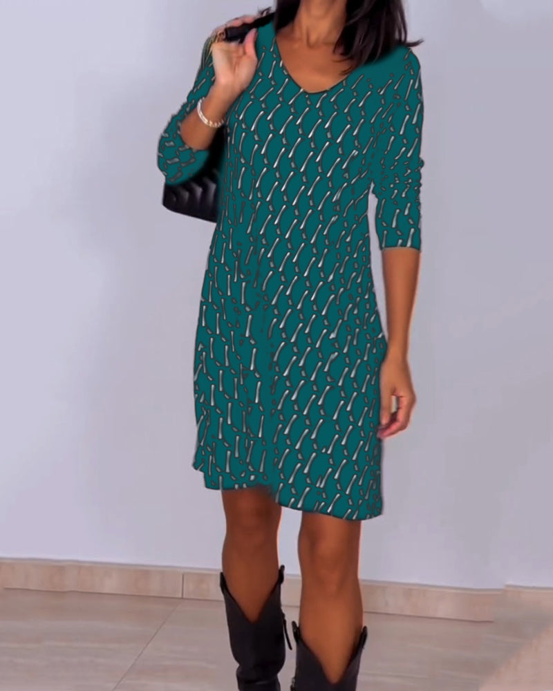 Van Elst Mode® | Jurk met V-hals en ruitjespatroon