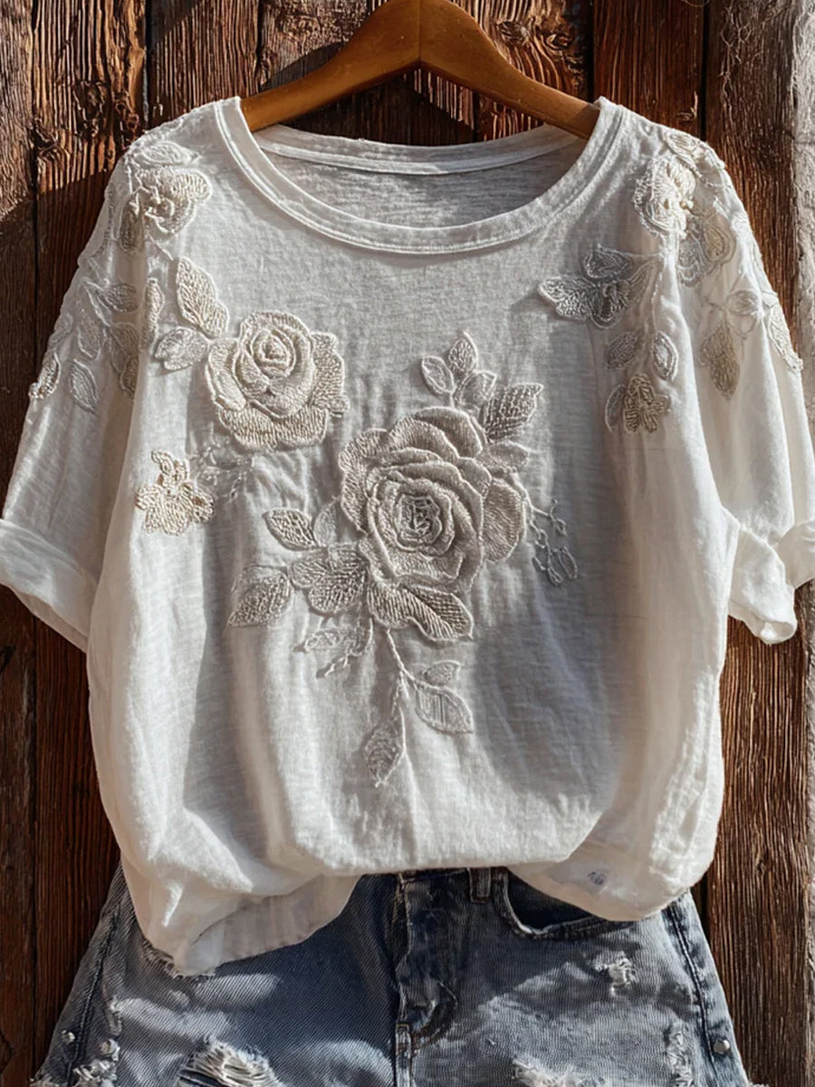 Casual en comfortabele T-shirt met retro bloemenkunstprint