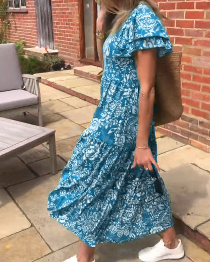 Van Elst Mode® | Lange jurk met korte mouwen en bloemenprint