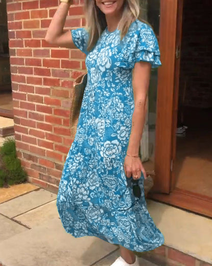 Van Elst Mode® | Lange jurk met korte mouwen en bloemenprint