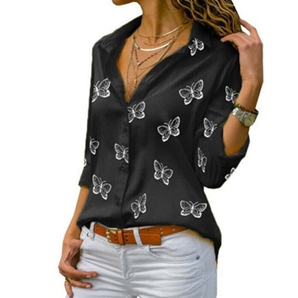 Van Elst Mode® | Losvallende blouse met vlinderprint