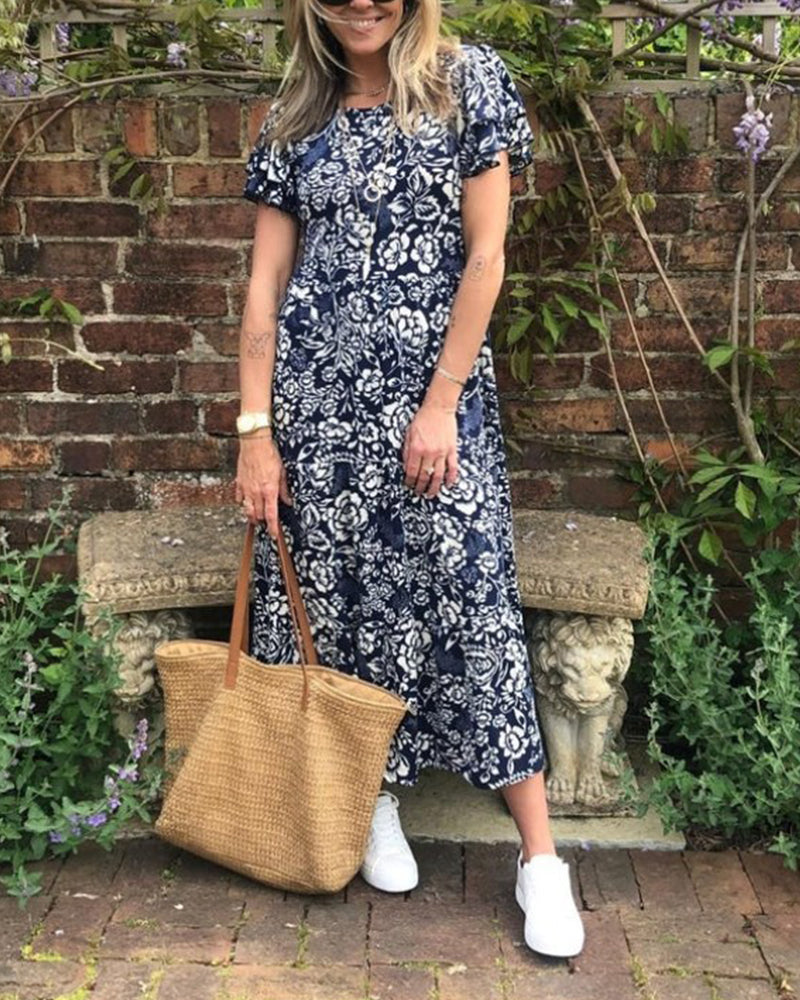 Van Elst Mode® | Lange jurk met korte mouwen en bloemenprint