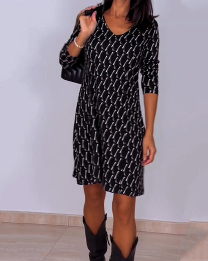 Van Elst Mode® | Jurk met V-hals en ruitjespatroon