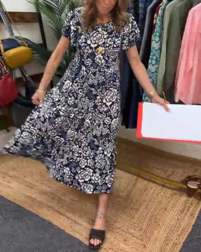 Van Elst Mode® | Lange jurk met korte mouwen en bloemenprint