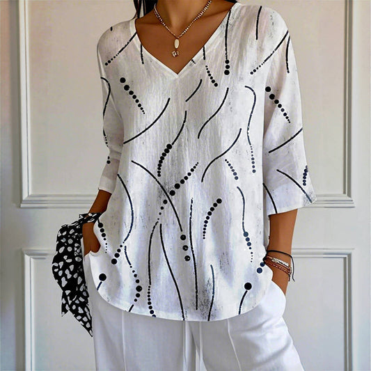 Van Elst Mode® | Blouse met speels lijnenspel en luchtige pasvorm